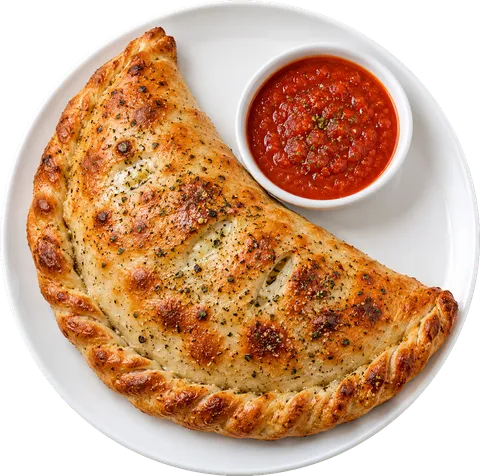A baked half-moon calzone on a white plate